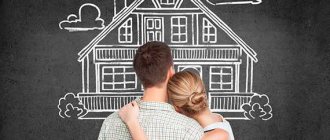 a girl and a guy stand in front of a painted house