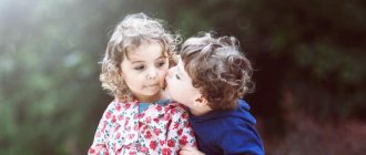 Boy kissing girl on the cheek