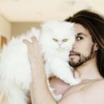 man with cat