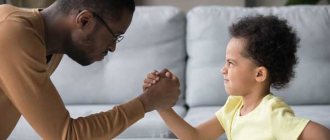 Dad and son measure strength