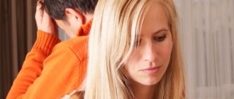 guy and girl stand with their backs to each other